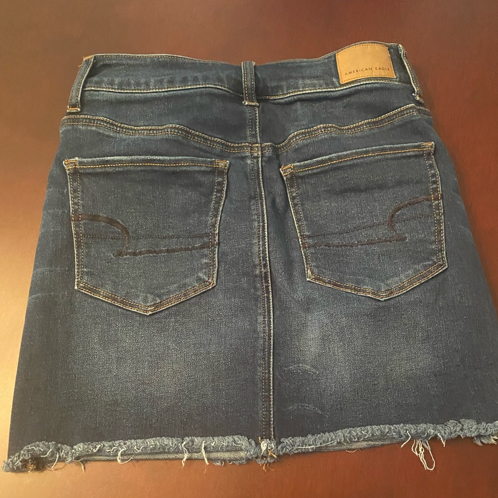 American Eagle Outfitters Jean skirt with frayed hem.  Size 2. - Picture 2 of 4